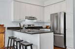 This stunning kitchen boasts modern design and functionality.