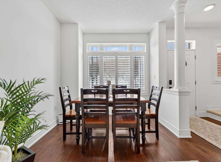 This stunning dining room boasts a modern design with a touch of elegance.