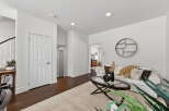 Step into this inviting living space, featuring a bright and airy ambiance.
