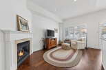 This stunning property boasts a cozy living room with a fireplace, perfect for those chilly evenings.