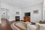 This stunning property boasts a cozy living room with a fireplace, perfect for those chilly evenings.