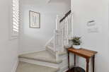 This stunning property features a beautifully designed staircase, perfect for adding a touch of elegance to your home.