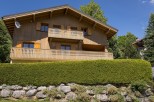 This charming chalet boasts stunning mountain views and features two spacious balconies perfect for enjoying the fresh air.