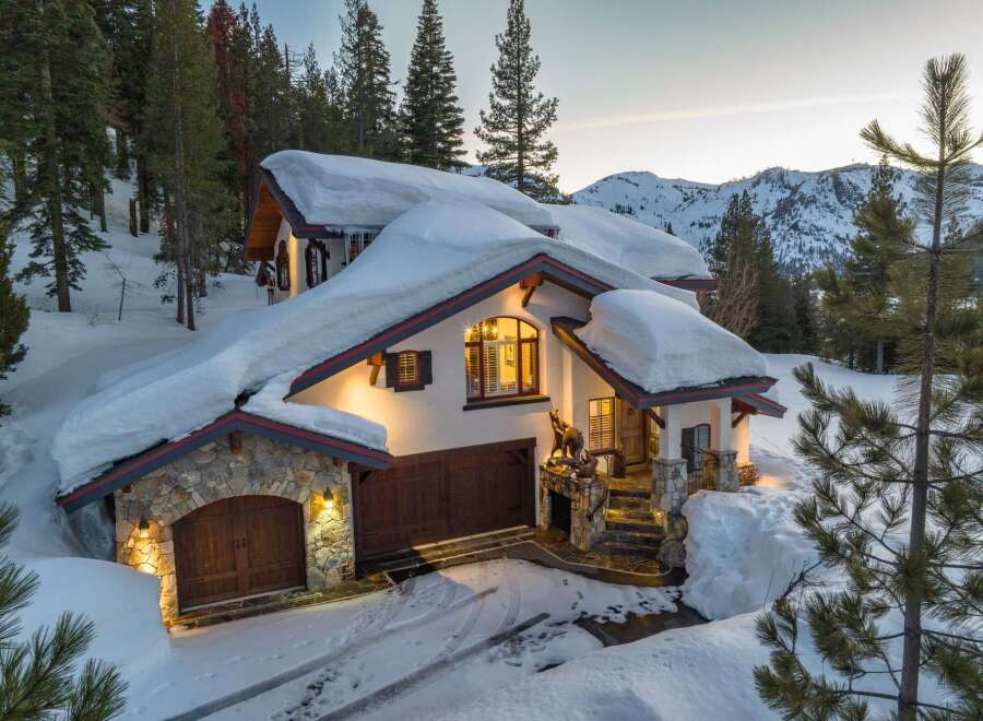 This stunning mountain home offers a perfect blend of luxury and natural beauty.