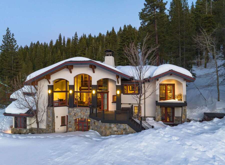 This stunning mountain home offers a luxurious retreat with its elegant design and prime location.