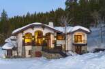 This stunning mountain home offers a luxurious retreat with its elegant design and prime location.