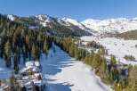 Discover a stunning mountain retreat nestled in a winter wonderland.