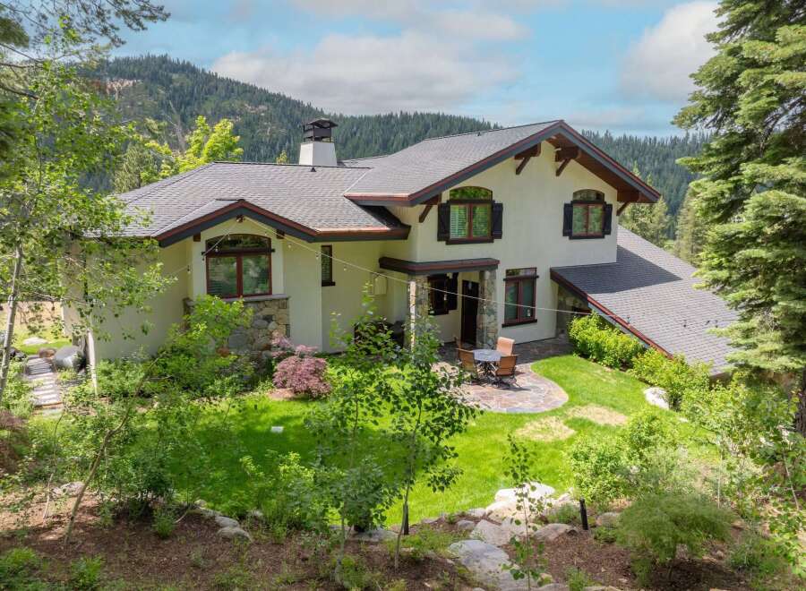 Nestled amidst lush greenery and mountain views, this stunning property offers a serene retreat.