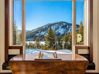 Enjoy breathtaking mountain views from this stunning property.