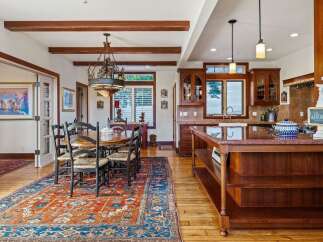 Step into luxury with this stunning property featuring a beautifully designed dining area and a gourmet kitchen.