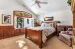 This stunning bedroom boasts a cozy and inviting atmosphere, perfect for relaxation.