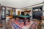 Step into luxury with this stunning property featuring a dedicated game room.