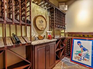 Step into luxury with this stunning wine cellar, perfect for the discerning homeowner.