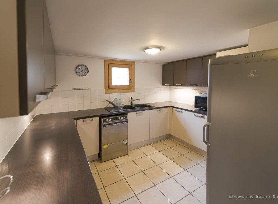 This charming kitchen boasts modern appliances and ample counter space, perfect for preparing delicious meals.