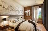 Experience the ultimate in mountain living with this stunning bedroom.