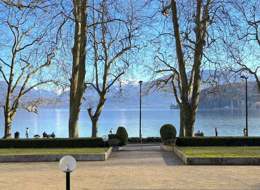 Enjoy breathtaking views of the lake and mountains from this stunning property.