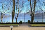 Enjoy breathtaking views of the lake and mountains from this stunning property.