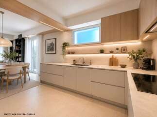 Experience modern living in this stunning kitchen featuring sleek, handleless cabinetry and integrated LED lighting for a sophisticated ambiance.