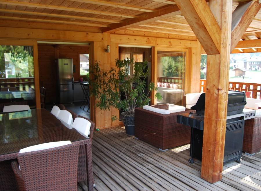 This stunning property boasts a spacious outdoor deck, perfect for entertaining guests.