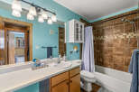 This charming bathroom features a bright and airy design, perfect for starting your day.
