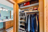 Step into this charming home and discover a well-organized closet, perfect for keeping your wardrobe tidy.