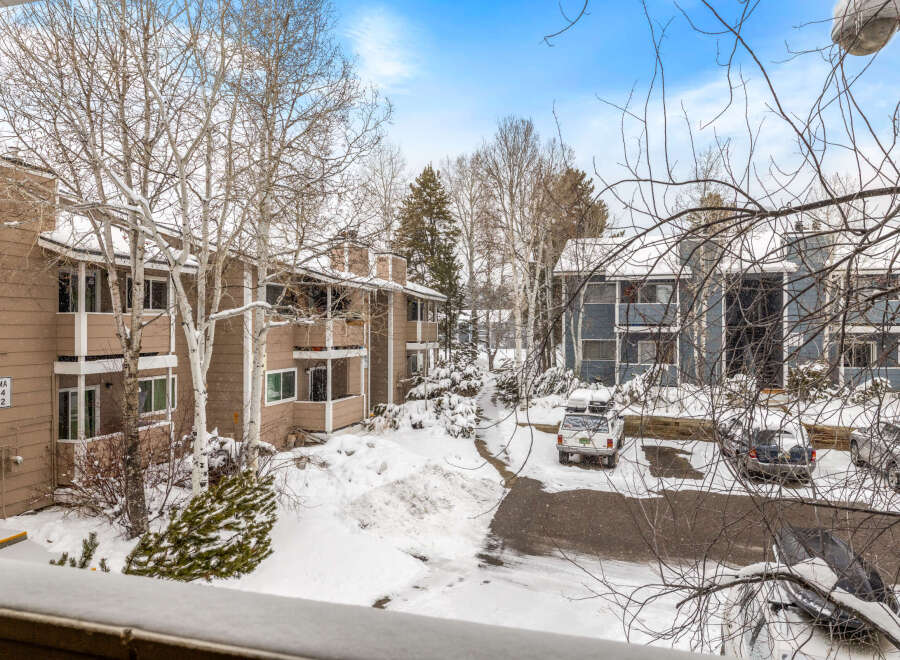 This charming property offers a serene winter escape with its snow-covered surroundings and cozy atmosphere.