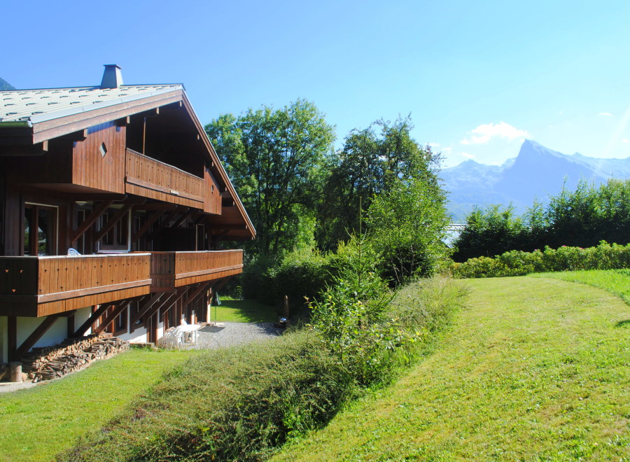 This stunning chalet boasts two spacious balconies, perfect for enjoying the breathtaking mountain views.