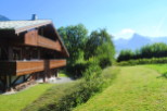 This stunning chalet boasts two spacious balconies, perfect for enjoying the breathtaking mountain views.