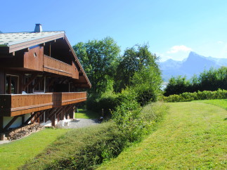 This stunning chalet boasts two spacious balconies, perfect for enjoying the breathtaking mountain views.