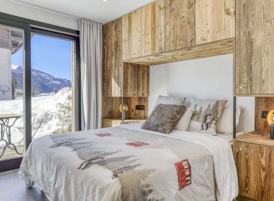 Experience the ultimate in alpine luxury with this stunning bedroom.