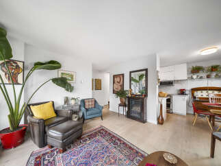 This stunning property boasts a bright and airy living space, perfect for modern living.