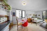 This stylish apartment features a bright and airy living space, perfect for modern living.