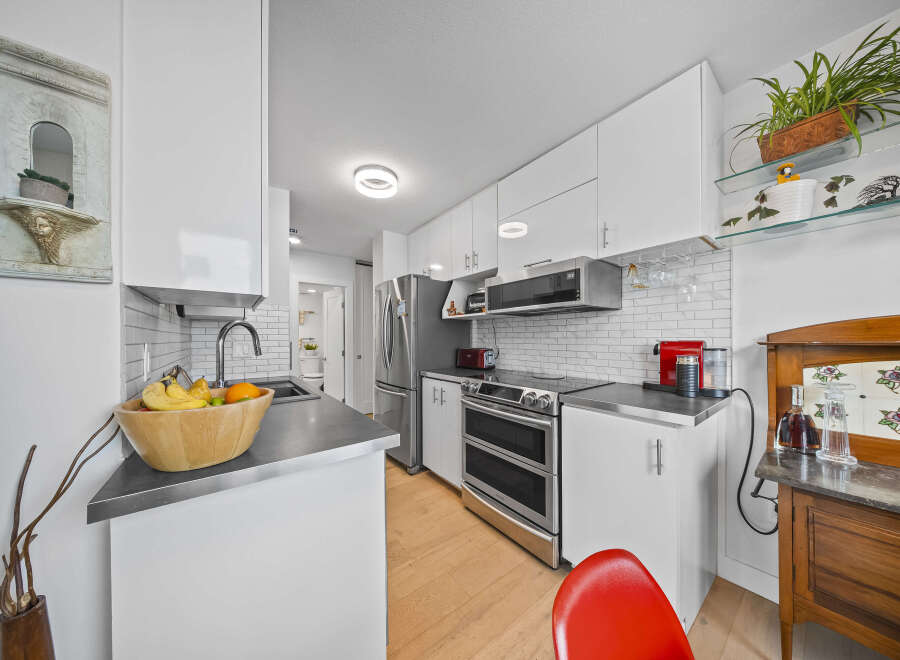 This stunning kitchen boasts modern design and functionality.