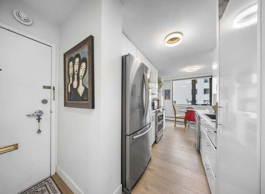Step into this stylish apartment and be greeted by a bright and airy entryway.