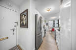 Step into this stylish apartment and be greeted by a bright and airy entryway.