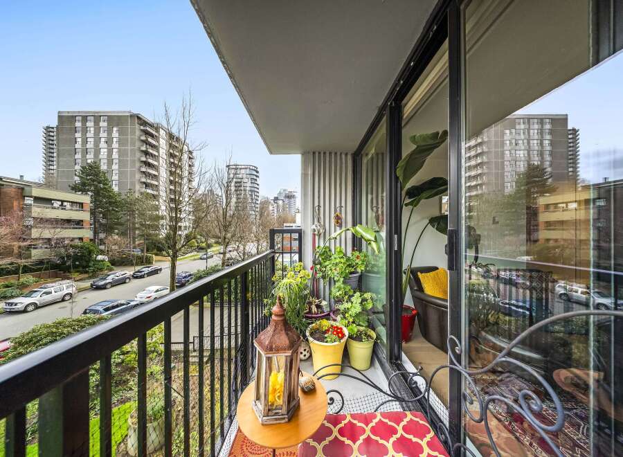 Enjoy stunning city views from this charming balcony.