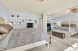 This stunning bedroom boasts a cozy and inviting atmosphere, perfect for relaxation.