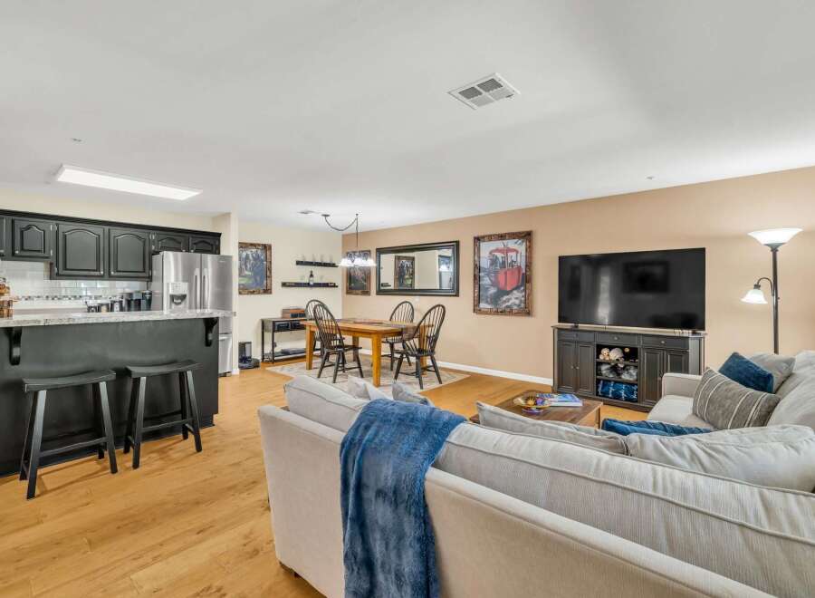 Step into this inviting living space, perfect for both relaxation and entertaining.