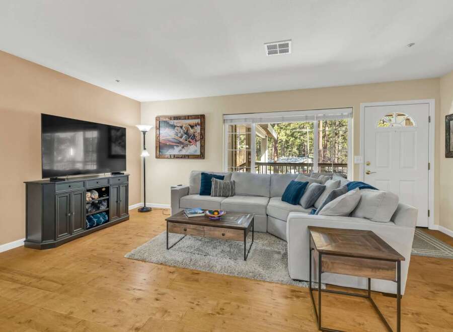Step into this inviting living space, perfect for relaxation and entertaining.