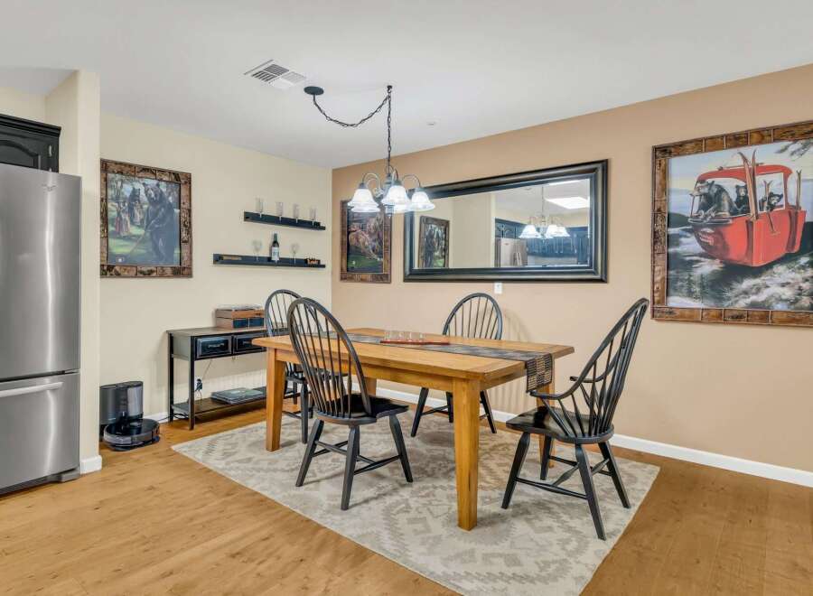 This dining room features a warm and inviting atmosphere, perfect for gatherings.