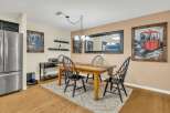 This dining room features a warm and inviting atmosphere, perfect for gatherings.