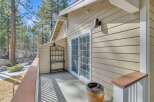 Enjoy the serene beauty of this property, featuring a charming balcony with a sliding glass door.