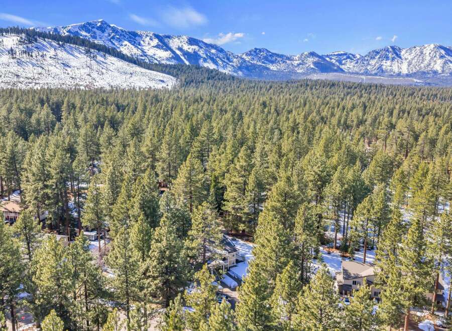 Nestled amidst a lush forest, this property offers a serene escape with stunning mountain views.