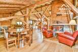 Discover the charm of this stunning property, featuring a rustic interior with exposed wooden beams and a cozy fireplace.
