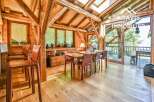 Experience rustic elegance in this stunning property, featuring a beautifully crafted wooden interior.