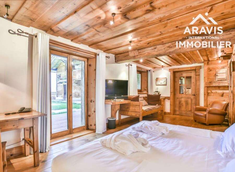 Experience the charm of this stunning property, featuring exquisite wooden accents throughout.