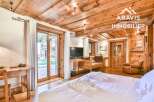 Experience the charm of this stunning property, featuring exquisite wooden accents throughout.