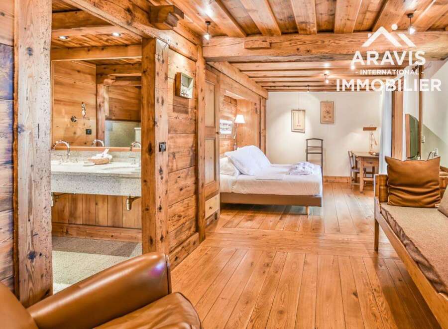 Discover the charm of this stunning property, featuring exquisite wooden interiors and a cozy ambiance.