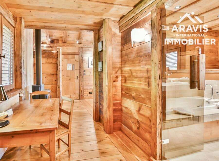 Step into rustic elegance with this stunning property featuring exquisite wooden interiors.