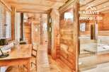 Step into rustic elegance with this stunning property featuring exquisite wooden interiors.